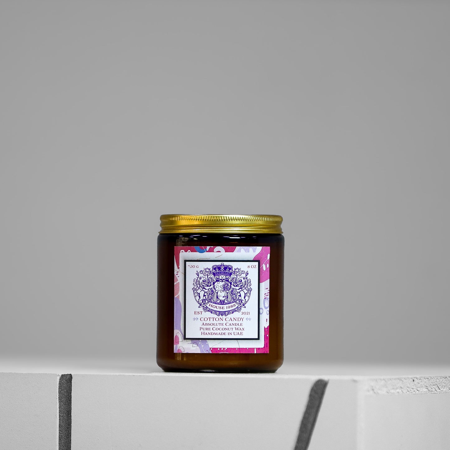 Amber glass jar with gold lid—House 1988 Cotton Candy Absolute Candle (200 g), pure coconut wax, handmade in the UAE.