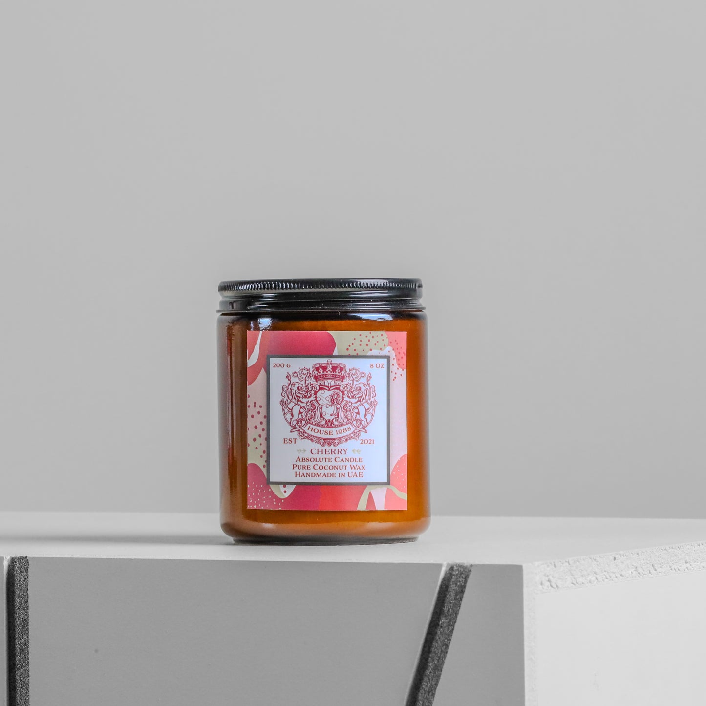 House 1988 Cherry Absolute candle, 200g amber jar with black lid and red crest label, coconut wax